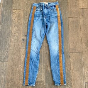 7 for All Mankind skinny jeans with side panel.